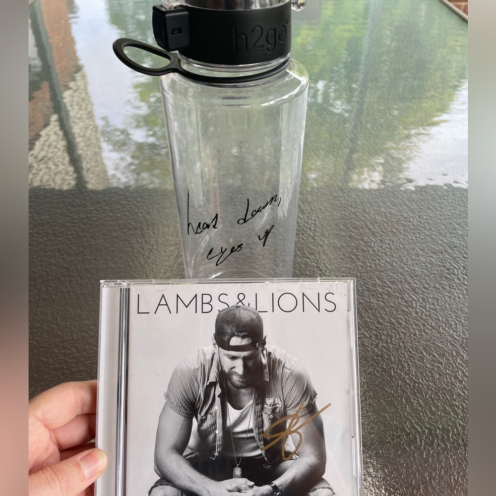 Autographed Chase Rice Lambs & Lions CD and water bottle